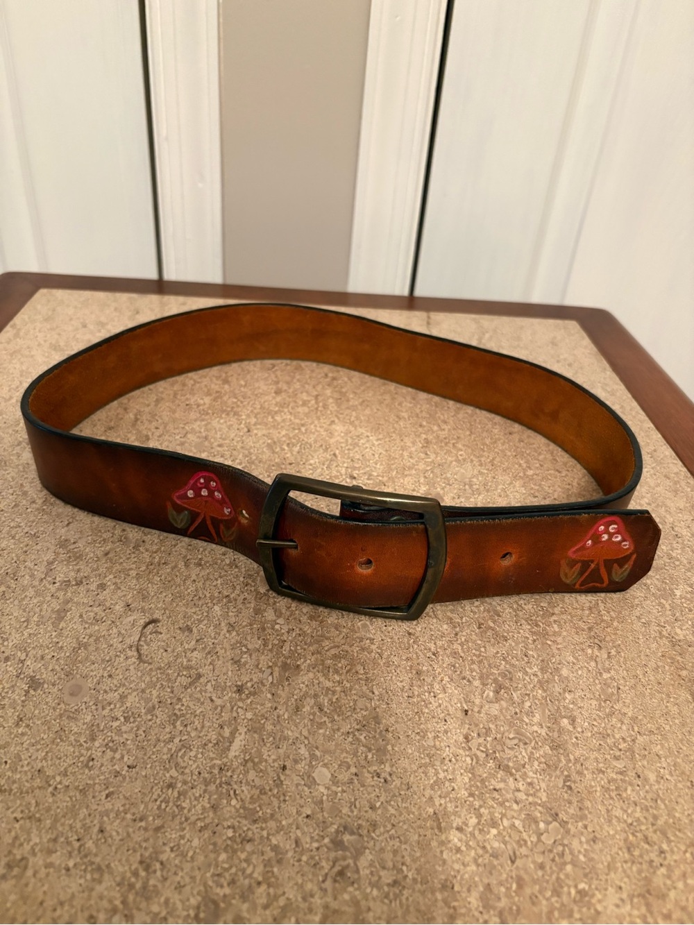 Leather belt with mushrooms
